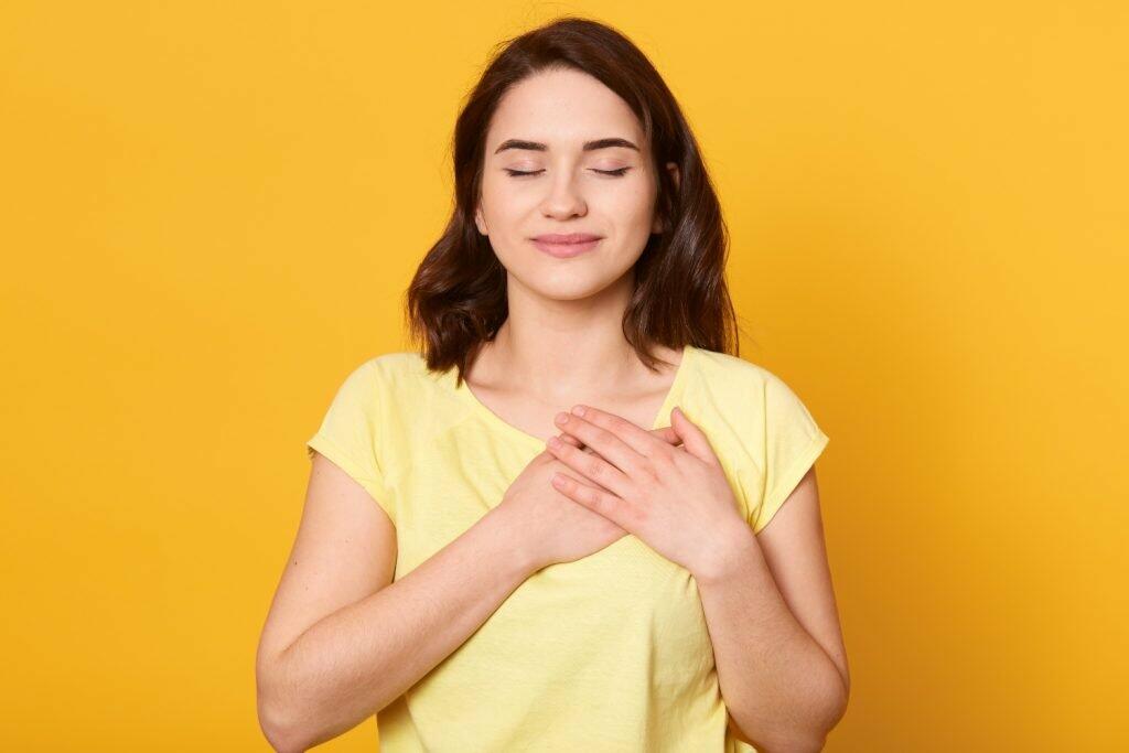 positive thinking woman in yellow